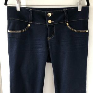 Studio F dark blue jeans. NEVER WORN. No trade